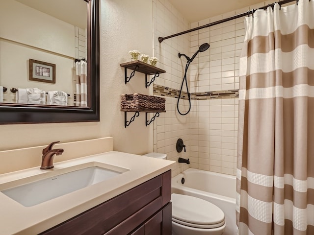 111 Corinthian Cir Unit A, Dillon, CO 80435 - bathroom featuring toilet, vanity, shower / tub combo with curtain, and a textured wall