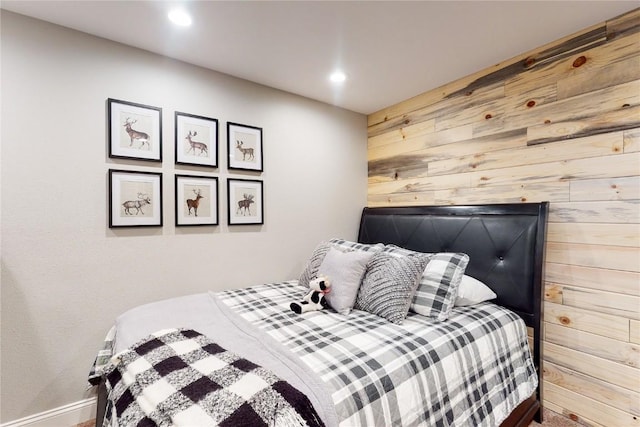 111 Corinthian Cir Unit A, Dillon, CO 80435 - bedroom featuring wooden walls, baseboards, and recessed lighting