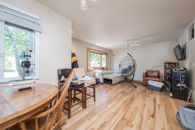 14 Redwood Ct Unit 14, Steamboat Springs, CO 80487 - dining space featuring light wood-type flooring and a ceiling fan