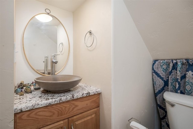 14 Redwood Ct Unit 14, Steamboat Springs, CO 80487 - half bath with vanity and vaulted ceiling