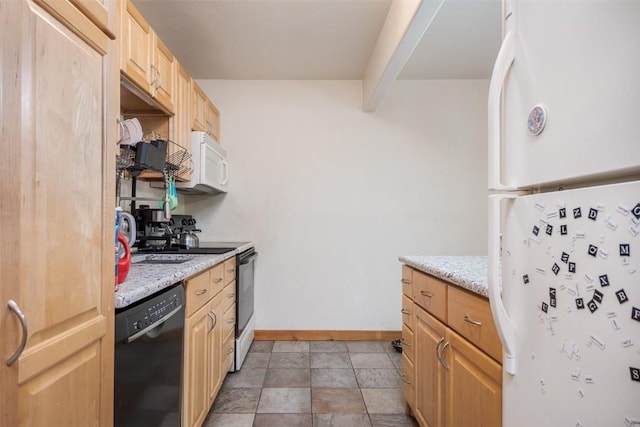 14 Redwood Ct Unit 14, Steamboat Springs, CO 80487 - kitchen featuring white appliances, light brown cabinets, and light stone counters