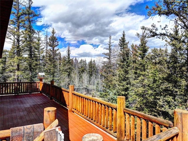 103 War Pony Way, Como, CO 80432 - wooden terrace with a wooded view