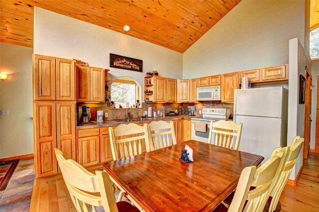 103 War Pony Way, Como, CO 80432 - dining area with high vaulted ceiling, light wood-type flooring, wooden ceiling, and baseboards
