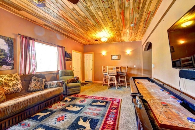 103 War Pony Way, Como, CO 80432 - carpeted living area with wood ceiling, arched walkways, and baseboards