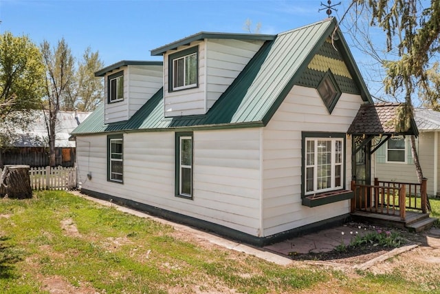609 E Jefferson Ave, Hayden, CO 81639 - view of home's exterior featuring fence
