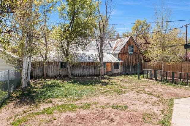 609 E Jefferson Ave, Hayden, CO 81639 - yard layered in snow with fence