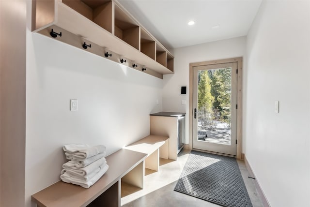 mudroom featuring recessed lighting and finished concrete floors