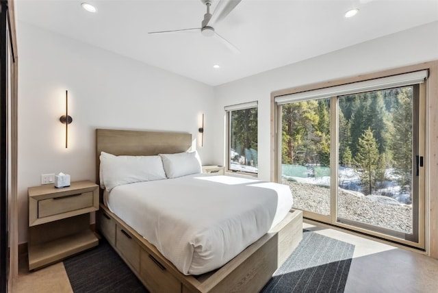 bedroom with a ceiling fan, recessed lighting, and access to exterior