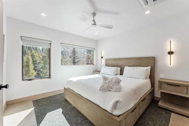 bedroom featuring dark carpet, baseboards, recessed lighting, and ceiling fan