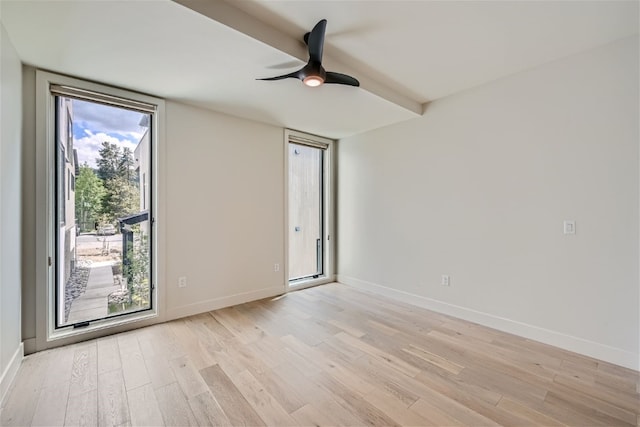 234 Frisco Aly Unit D, Frisco, CO 80443 - spare room with a ceiling fan, baseboards, and light wood-style floors