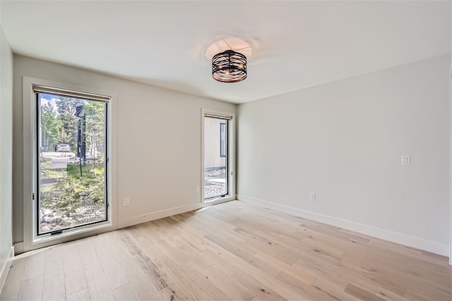 234 Frisco Aly Unit D, Frisco, CO 80443 - unfurnished room with baseboards and light wood finished floors