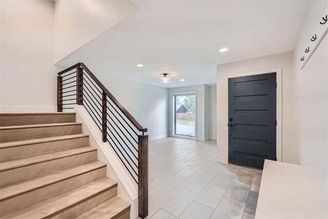 234 Frisco Aly Unit D, Frisco, CO 80443 - entrance foyer featuring recessed lighting, stairway, and baseboards
