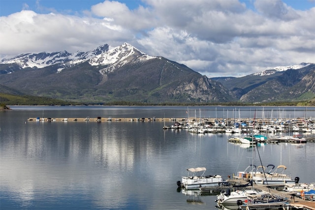 576 Tenderfoot St Unit 163, Dillon, CO 80435 - water view with a mountain backdrop and a boat dock