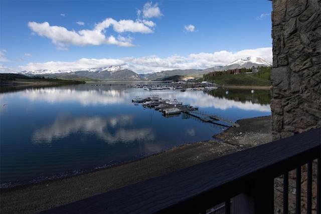 576 Tenderfoot St Unit 163, Dillon, CO 80435 - water view with a mountain backdrop and a dock