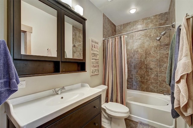 full bathroom featuring shower / tub combo, toilet, and vanity