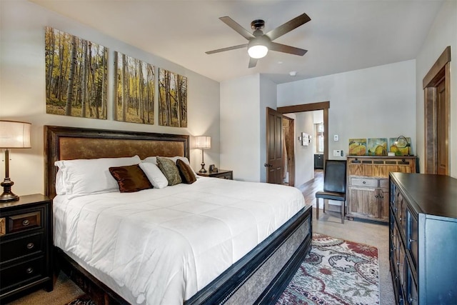 bedroom featuring ceiling fan and carpet floors