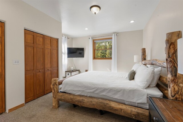 227 Mountain View Dr, Breckenridge, CO 80424 - bedroom with light colored carpet, baseboards, recessed lighting, and a closet