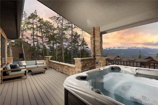 260 N Fuller Placer Rd, Breckenridge, CO 80424 - wooden terrace featuring a hot tub, outdoor lounge area, and a mountain view