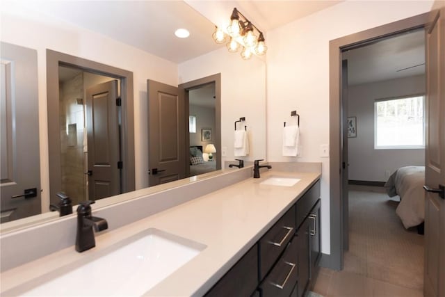 260 N Fuller Placer Rd, Breckenridge, CO 80424 - ensuite bathroom featuring double vanity and baseboards