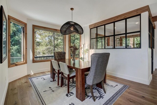 1106 Bright Hope Ln, Breckenridge, CO 80424 - dining room with baseboards and light wood finished floors