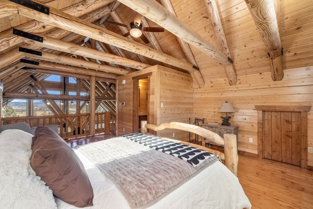 bedroom with wood-type flooring, wood walls, wood ceiling, and lofted ceiling with beams
