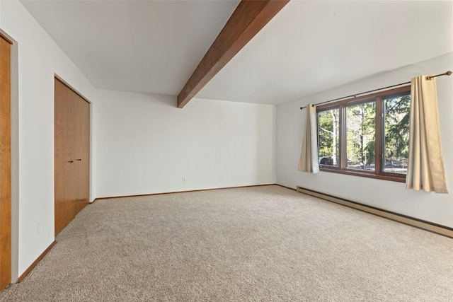 spare room featuring a baseboard heating unit, beamed ceiling, carpet floors, and baseboards