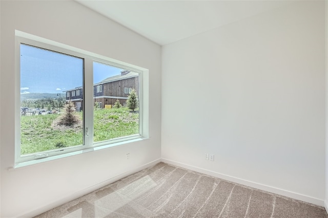 350 Stan Miller Unit 100, Breckenridge, CO 80424 - empty room featuring plenty of natural light and carpet floors