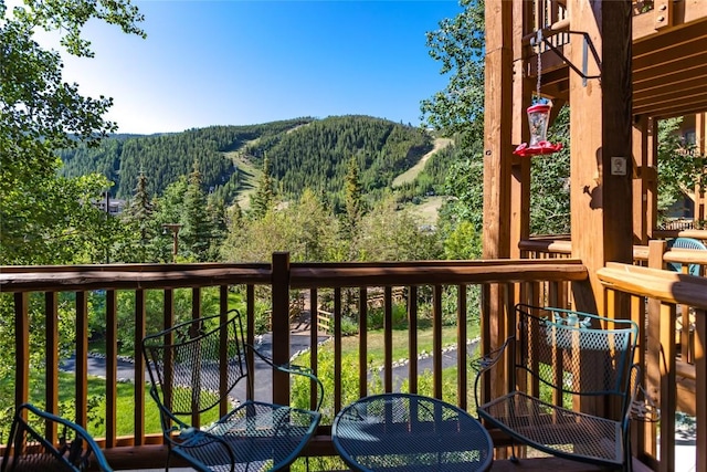 22784 US Highway 6 Unit 2626, Dillon, CO 80435 - balcony with a wooded view and a mountain view
