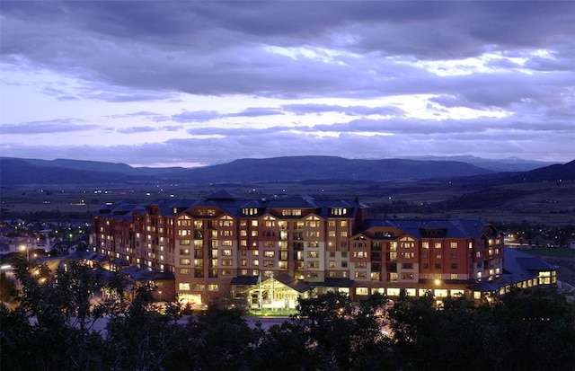 property's view of city featuring a mountain view