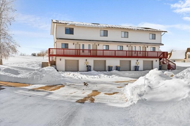 view of snow covered house