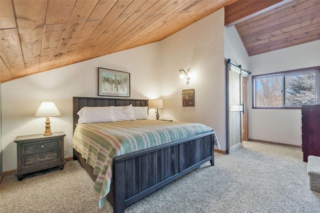 2915 Chinook Ln Unit B22, Steamboat Springs, CO 80487 - bedroom featuring vaulted ceiling, wood ceiling, carpet, a barn door, and baseboards
