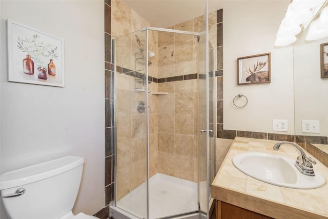 2915 Chinook Ln Unit B22, Steamboat Springs, CO 80487 - bathroom with toilet, vanity, and a shower stall