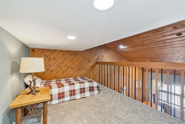 sitting room featuring recessed lighting and wooden walls