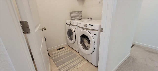 9279 Merino Ct # B, Littleton, CO 80125 - washroom with washer and clothes dryer and baseboards