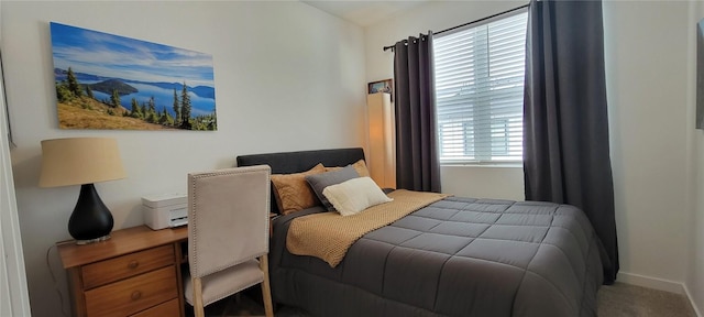 9279 Merino Ct # B, Littleton, CO 80125 - carpeted bedroom with a desk and baseboards