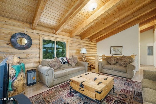 90 Gcr 864, Tabernash, CO 80478 - living area featuring log walls, lofted ceiling with beams, wood ceiling, and wood finished floors