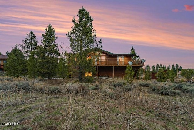 90 Gcr 864, Tabernash, CO 80478 - back of house at dusk featuring a deck