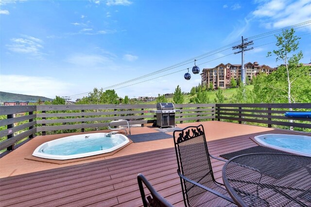 2350 Ski Trail Ln Unit 136, Steamboat Springs, CO 80487 - wooden deck with area for grilling