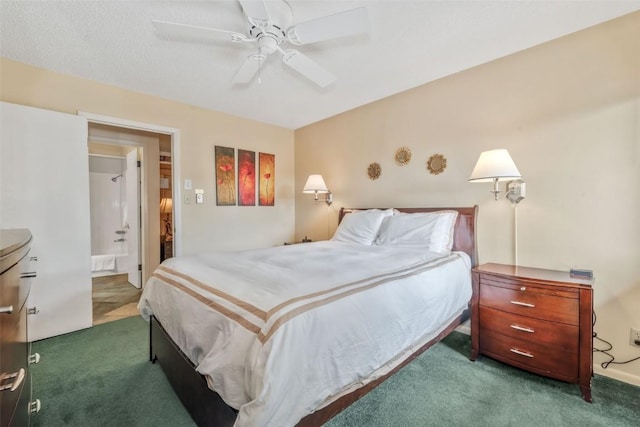 carpeted bedroom with a ceiling fan and ensuite bath