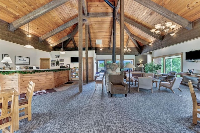 2350 Ski Trail Ln Unit 136, Steamboat Springs, CO 80487 - living room with a chandelier, high vaulted ceiling, wood ceiling with exposed beams, and carpet floors