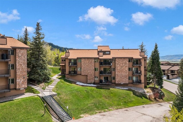2350 Ski Trail Ln Unit 136, Steamboat Springs, CO 80487 - view of building exterior with a mountain view