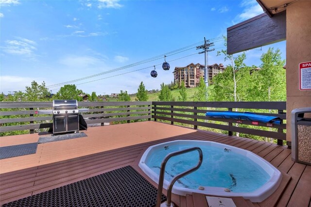 2350 Ski Trail Ln Unit 136, Steamboat Springs, CO 80487 - wooden terrace featuring a grill
