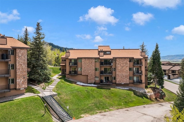 view of building exterior with a mountain view