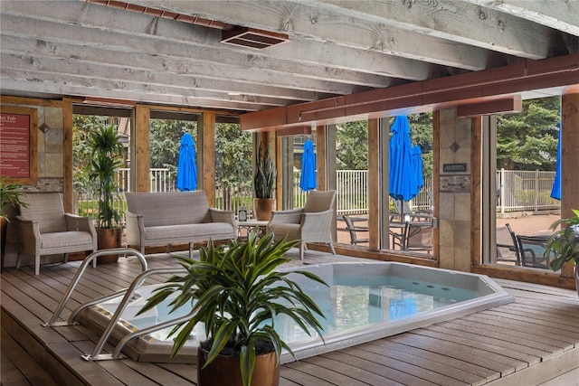 sunroom / solarium with plenty of natural light