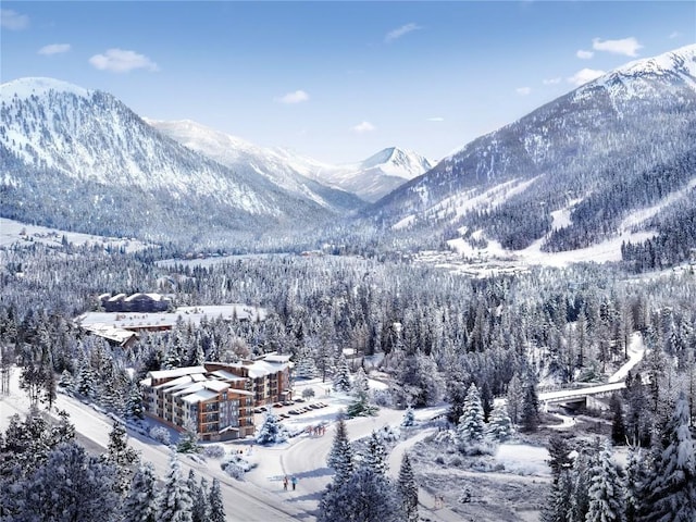 mountain view featuring a forest view