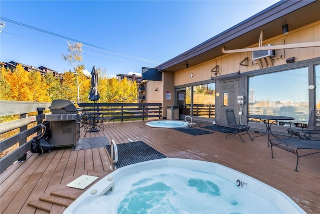 2350 Ski Trail Ln Unit 112, Steamboat Springs, CO 80487 - wooden terrace featuring grilling area and outdoor dining area