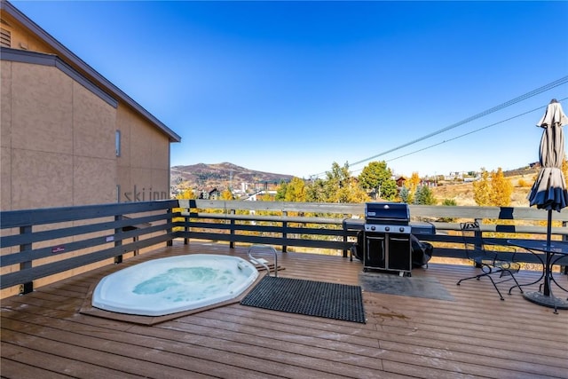 2350 Ski Trail Ln Unit 112, Steamboat Springs, CO 80487 - wooden terrace featuring a mountain view and area for grilling