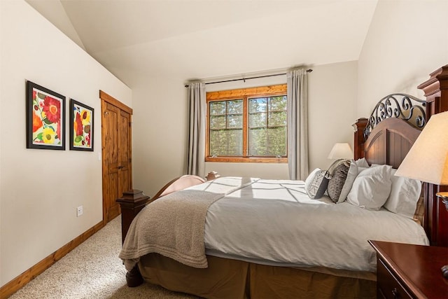 366 Moonstone Rd, Breckenridge, CO 80424 - carpeted bedroom with lofted ceiling and baseboards