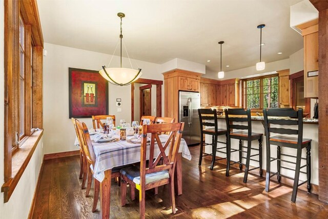 366 Moonstone Rd, Breckenridge, CO 80424 - dining space featuring dark wood-style floors and baseboards