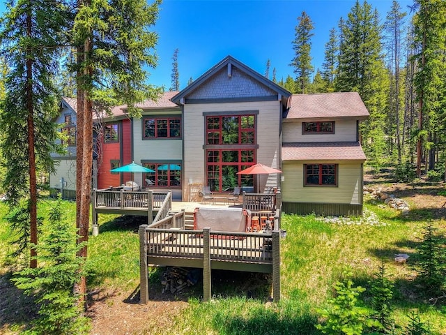 366 Moonstone Rd, Breckenridge, CO 80424 - back of house featuring a deck, roof with shingles, and outdoor dining area
